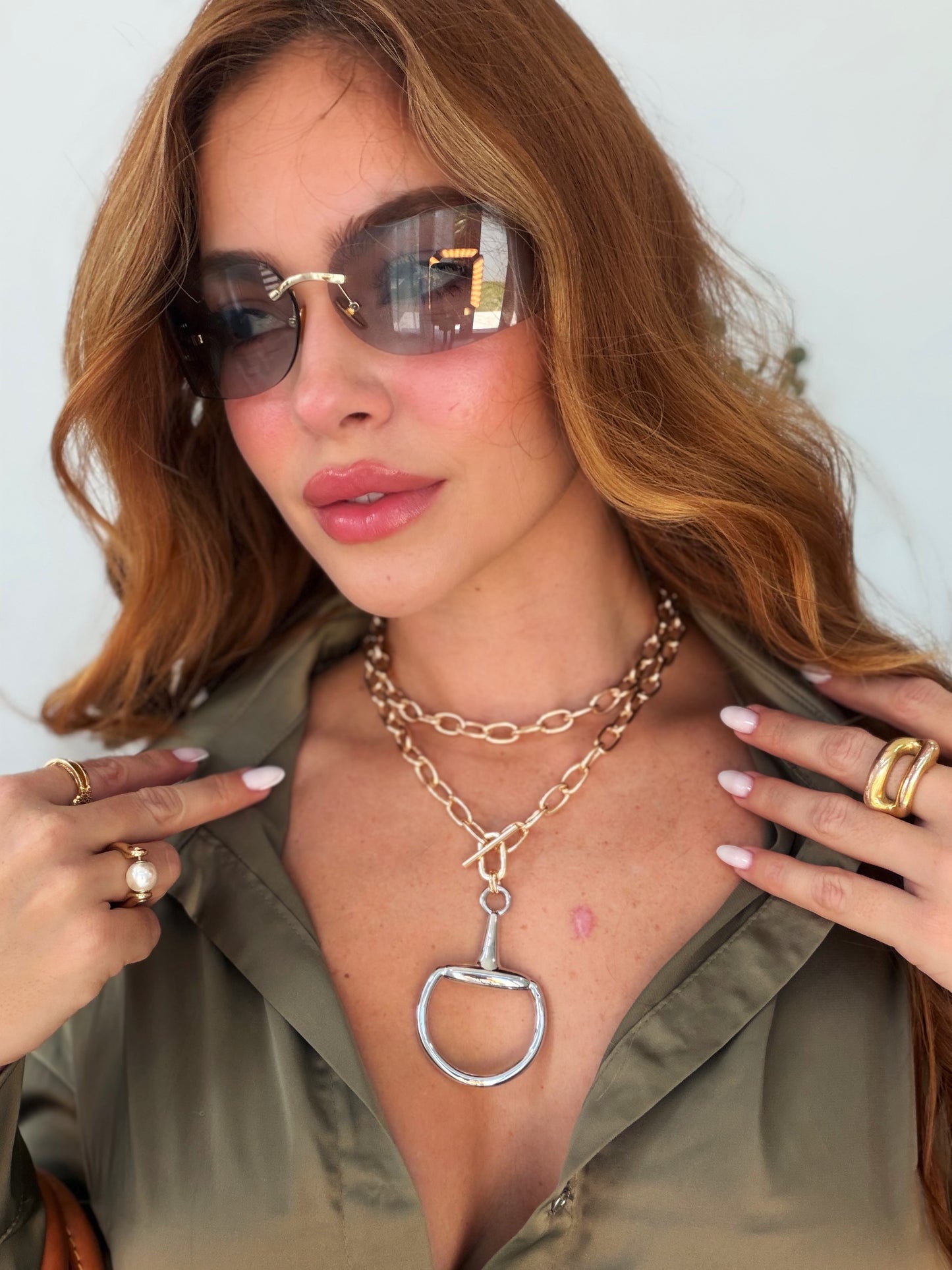 IN NECKLACE